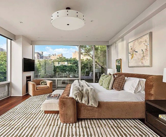 Primary bedroom opening onto its private planted terrace